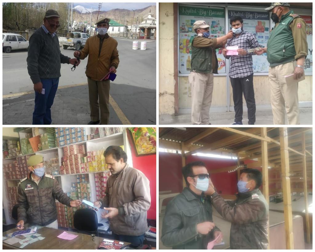 LehPolice's tweet photo. Penalty with awareness#Teams of  Police Station Leh today provided free face masks to the offenders after  challaning them for not wearing face masks, accomplishing dual objective of penalty &amp; awareness.
Till now,90 persons are challaned for not wearing face mask at public places https://t.co/ixRH36VvJo
