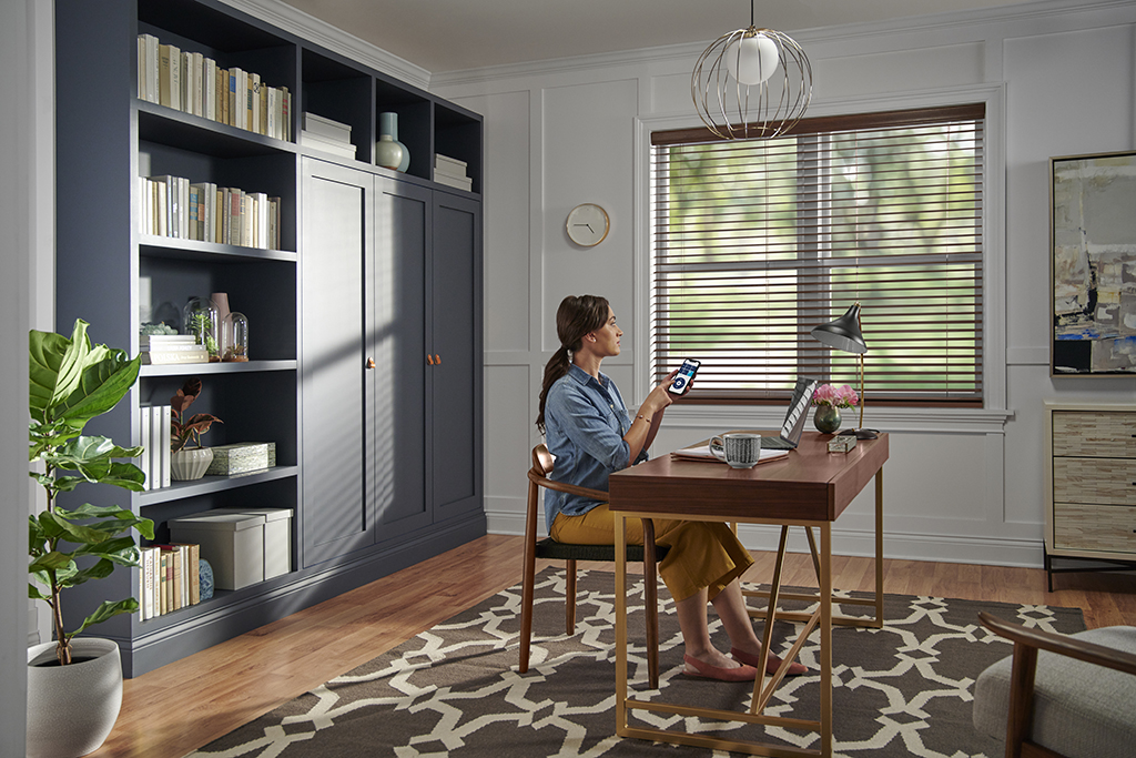One less distraction. Reduce glare from pesky sun rays in your home office with just a simple click and motorized real wood blinds. bit.ly/2JvtIb7