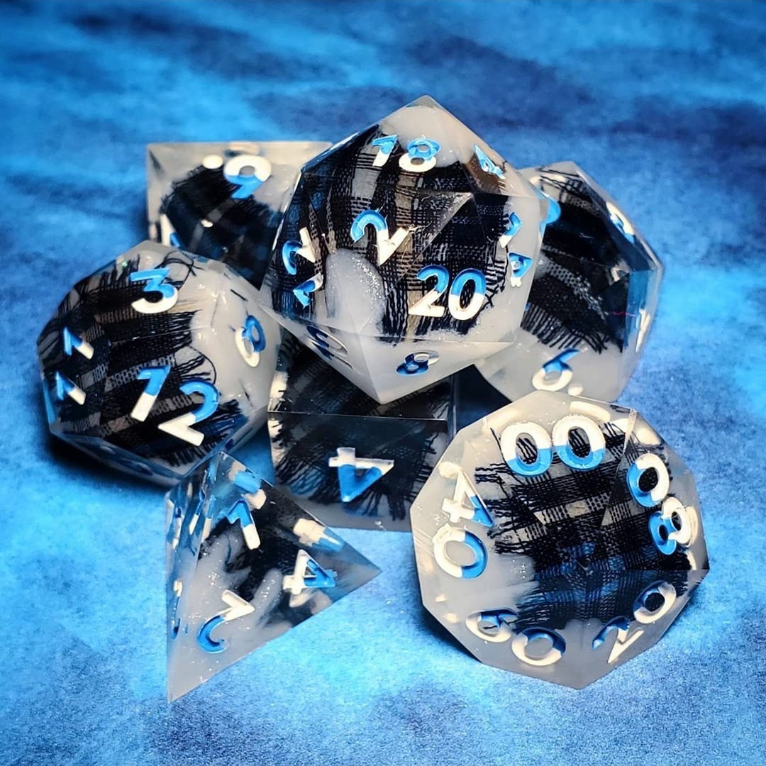The dice I made for my character, Scott Marshall Flannelhammer for the #criticalconvergence stream this saturday!!!
.
 #diceporn #handmadedice #dicemaker #dice #diceporn #resincraft #dnd #dndbeyond #criticalrole #critters #dndcommunity #ttrpg #diceyencounters