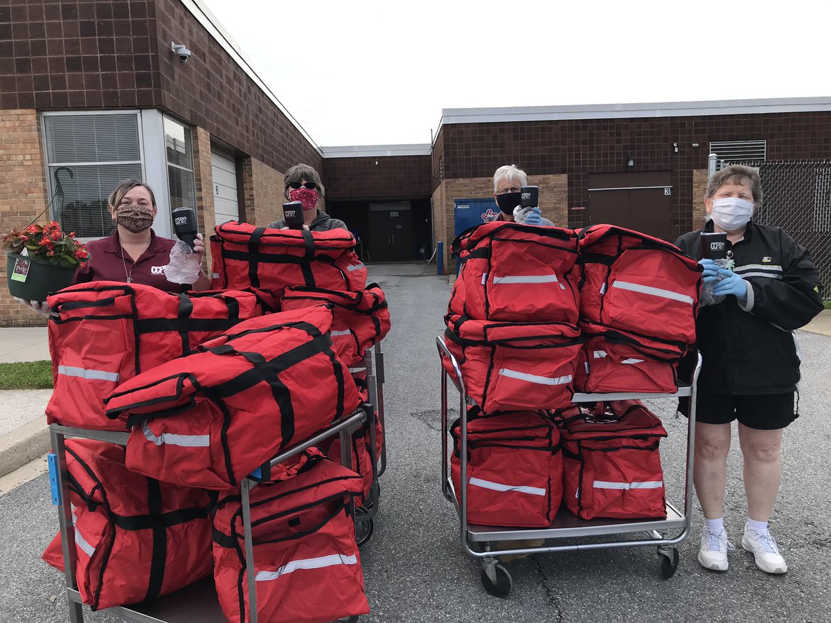 Bags are packed and busses are ready to roll!  A HUGE thanks to these masked marvels at Northwest Middle....you rock! <a href="/CCPSk12/">Carroll County PS</a> #SchoolLunchHeroesMD #SchoolLunchHeroes #togetheritspossible