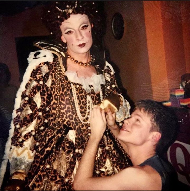 "Today the #QueerAsFolk 20th reunion youtu.be/XRUfEudtSmQ. 
Here's a shot of Randy Harrison and I, on the show back in 2000. Fun fact: for this particular scene I was wearing a gown originally worn by Andrea Martin (as Edith Prickley) on SCTV"
Credits to Salvatore Antonio