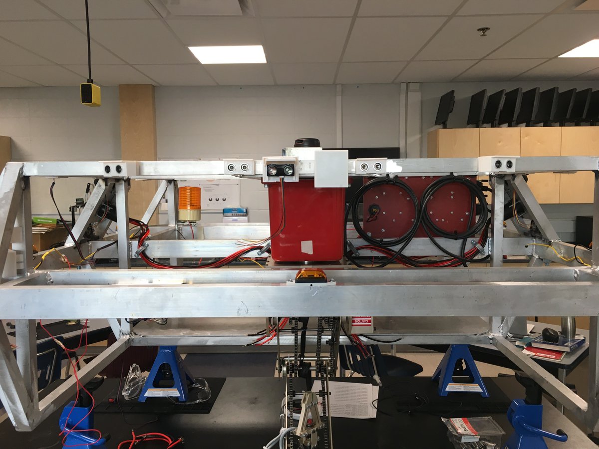 KevinHubick's tweet photo. I finished mounting the rover's fixed sensors. There are 17 short range HC-SR04 ultrasonic sensors and 5 long range narrow beam Garmin LIDAR-Lite v3 laser sensors distributed around the chassis plus an additional forward facing wide beam Omni PreSense OPS241-B radar sensor. https://t.co/6H4SP8K7Dn