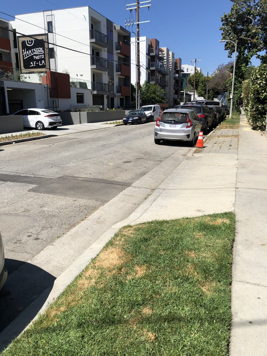 RoadSageLA's tweet image. One thing this crisis has taught me is that weekly street sweeping in LA is by and large a racket, and completely unnecessary. This street hasn’t been swept in nearly two months. Does it look worthy of a 70 dollar fine for not moving my car twice a week @MayorOfLA?