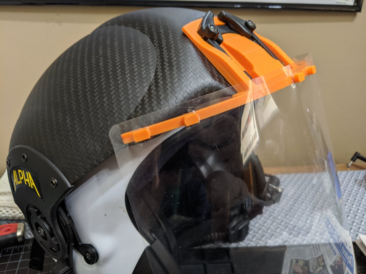 CareFudundae's tweet photo. Presenting the Bowshock: an Alpha Flight Helmet NVG-Mounted #3DPrinted Face Shield!
#DaytonFightingCOVID  #PPE
@masksfordocs

thread (1/6)
A week ago, our @MakeItDayton group (associated w/ @masksfordocs) designed a face shield that would mount to a flight nurse's helmet... https://t.co/kqLezzG258