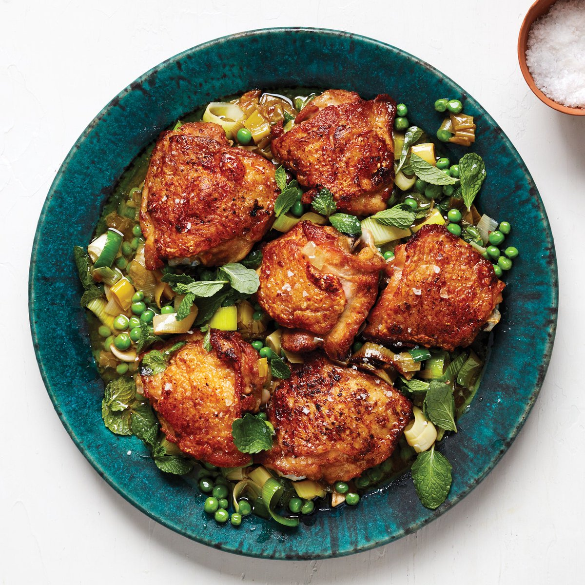 FaveThingCom's tweet photo. A low-maintenance, quick-cooking, delicious chicken meal! Check out the recipe for Roast Chicken Thighs with Peas and Mint on FaveThing! https://t.co/CVYnYJ1Otf #FaveThing #RoastChicken #ChickenRecipe #Recipe #SpringRecipe #BonAppetit https://t.co/pZJgGb1jn0