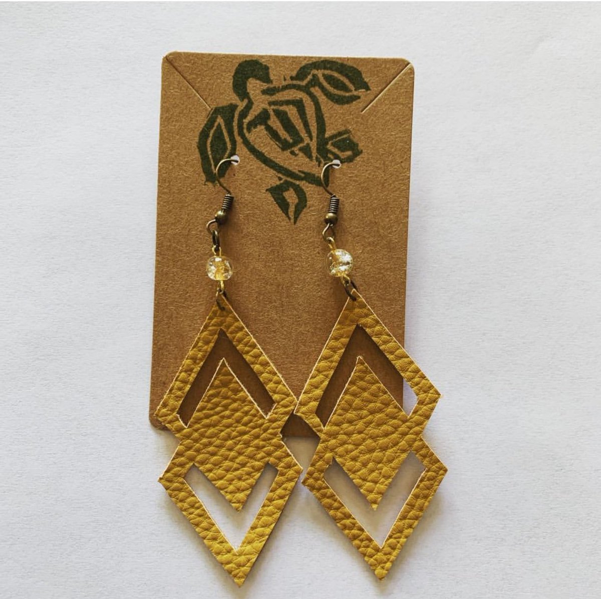 Custom handmade earring faux leather, with bead accents $10
-
-
#jewelybyturtle #handemadejewelry #makersgonnamake  #monmouthcounty