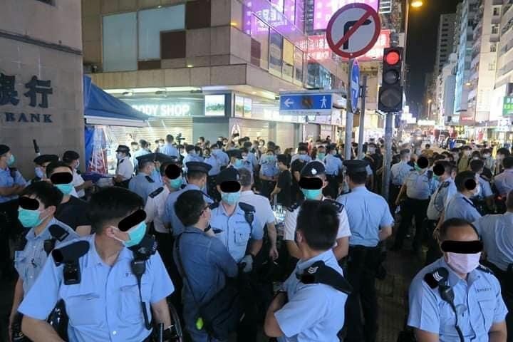 Guess the number of #HKpolice needed to arrest 7 young people who are delivering free masks, because they allegedly violated the 'crowd gathering' law? #Irony #FightForFreedom #StandWithHK ps. Find the person/s who is/are arrested?