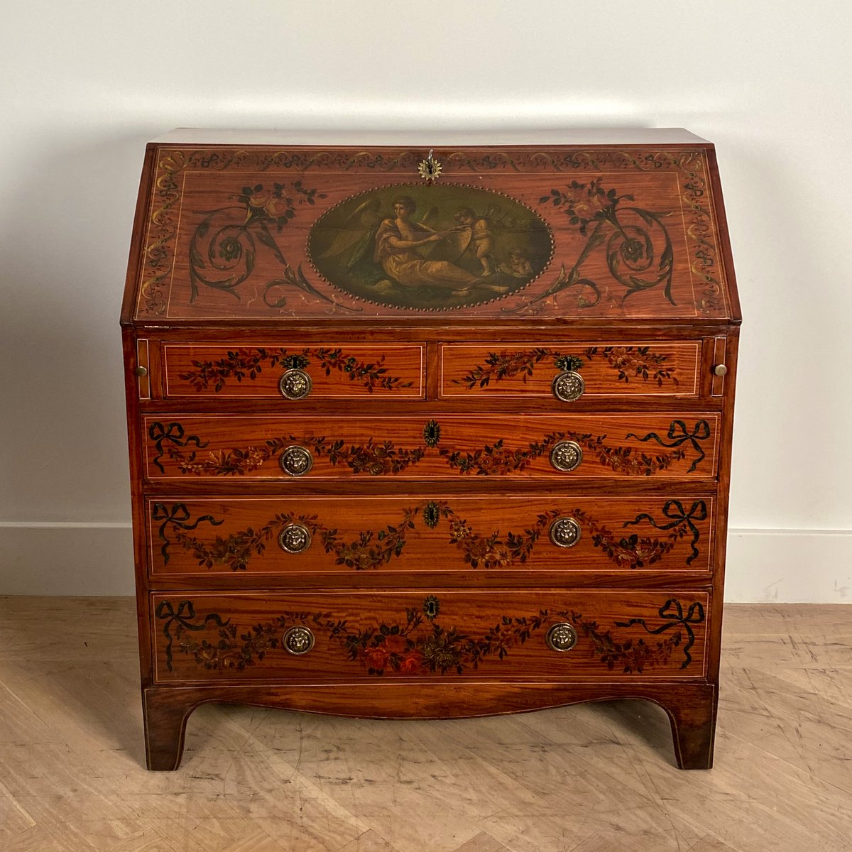 Georgian Fancy Painted Slant Front Desk, England Circa Early 19th Century
An early 19th Century George III Period fancy painted satinwood slant front desk
43' High 39.25' Wide 20' Deep
#georgian #slantfrontdesk #english #GeorgeIII #frontdesk #painteddesk #englishdesk #aaxsf