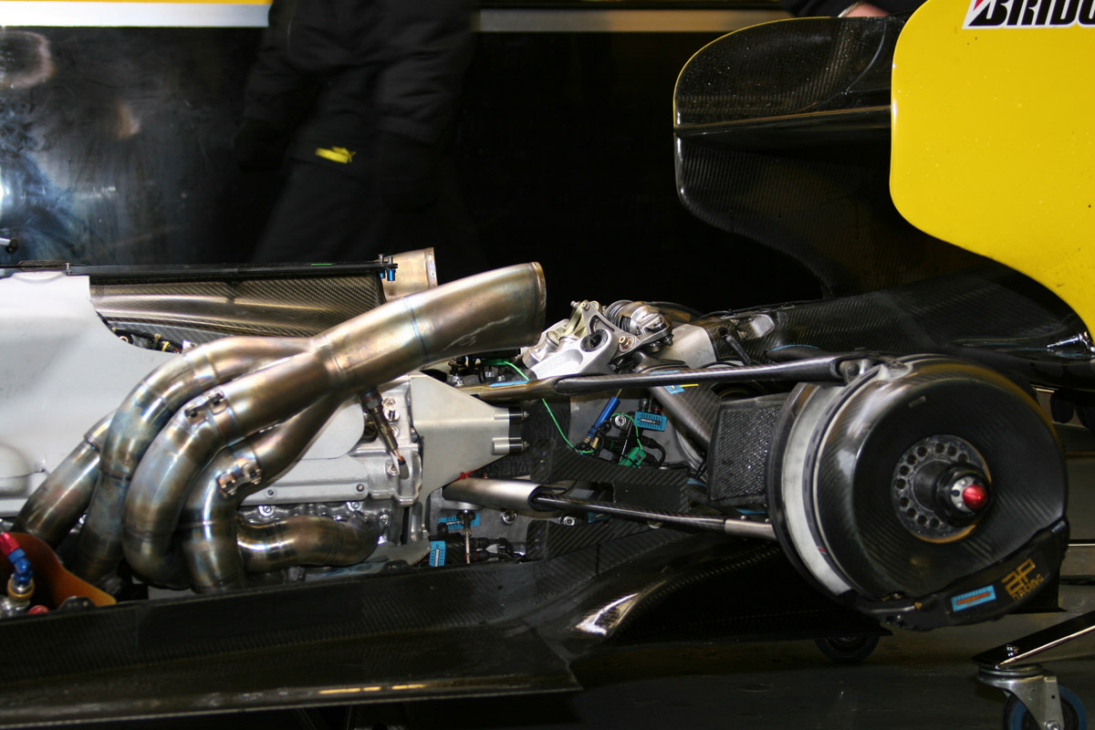 Having exhausts through the suspension, the introduction of carbon suspension arms, meant the heat could weaken them. Ferrari put the exhaust up and over the bodywork to take the heat issue away. The blown effect was rear bodywork, cooling outlets or even the rear wing