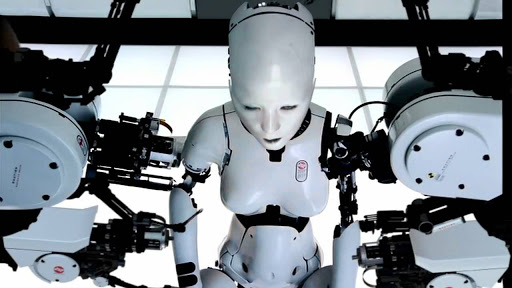 All is Full of Love (1999)In the critically lauded video, an ethereal, white room is shown, where a robot with Björk's features lies in a fetal position. As the room lightens up, two mechanical arms begin to assemble the robot. The robot looks up to see another robotic Björk.