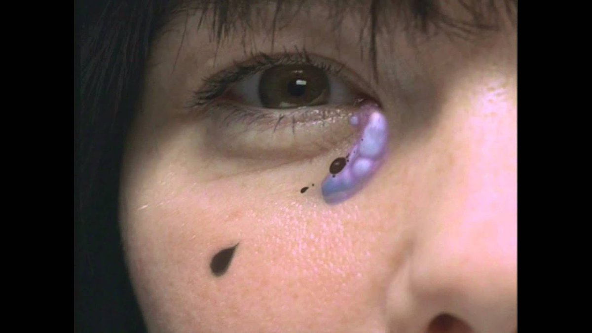 Hidden Place (2001)The video consists of close-up shots panning around Björk's face, as fluids flow in and out of her facial orifices.