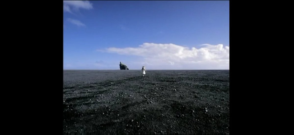 Who Is It (2004)In the video, Björk wears a dress made of bells, by Alexander McQueen, and perform the song while accompanied by a group of children, also wearing outfits adorned with bells.