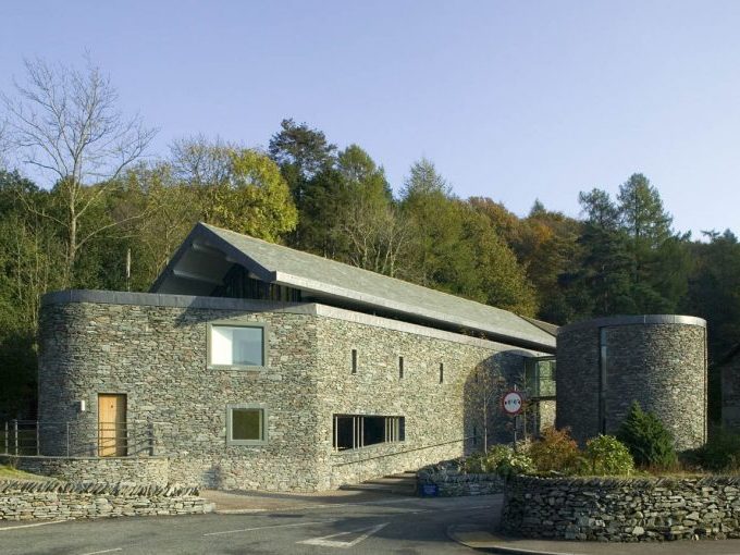 Project: Wordsworth Museum, Grasmere. Architect: Napper Architects. Material: Westmorland green weathered slate walling stone. Specification: Stone laid to a 200mm bed, back bedded to replicate open joints, with complementing Westmorland green honed slate window surrounds.