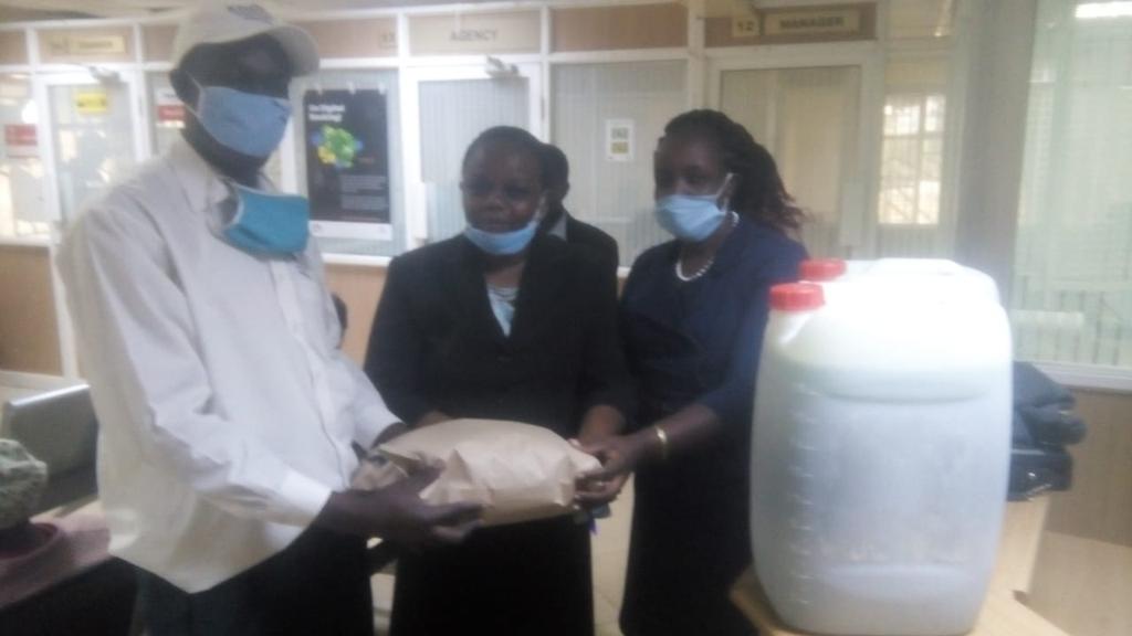 VihigaChamber's tweet photo. @VihigaChamber  team receiving 100 littles of sanitizers and 1000 face masks from @KeEquityBank mbale branch manager Mrs. Jane Ogutu to distribute in markets 2 help combat spread of Corona virus @CIPEKenya @Ngatia_Richard @CIPEglobal @BenKiragu3 @DrEricRuto @CIPEAfrica @Niusline https://t.co/i5IIPDFIvQ