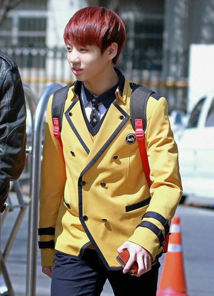 Koo and his yellow uniform with red hair