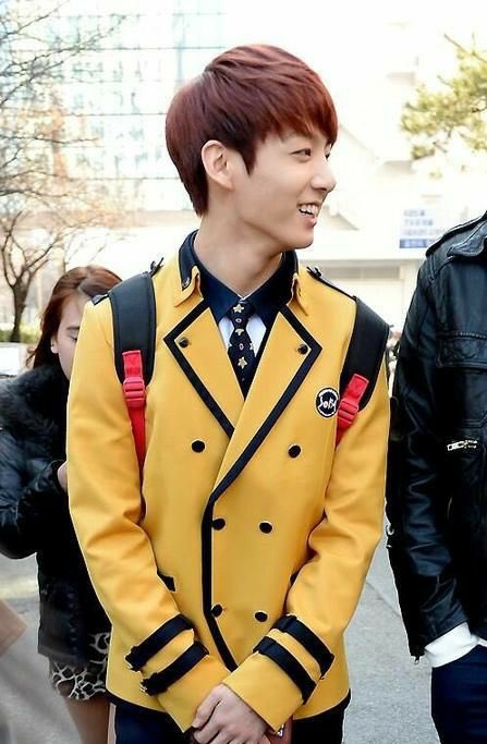 Koo and his yellow uniform with red hair
