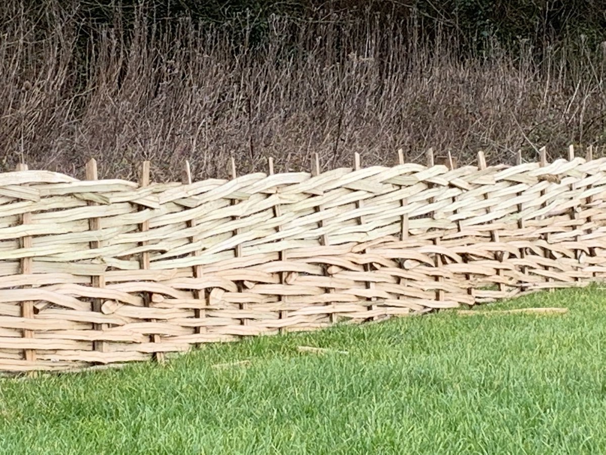 Continuous Weave fences are built on site as a more decorative garden feature and are useful on undulating ground.
