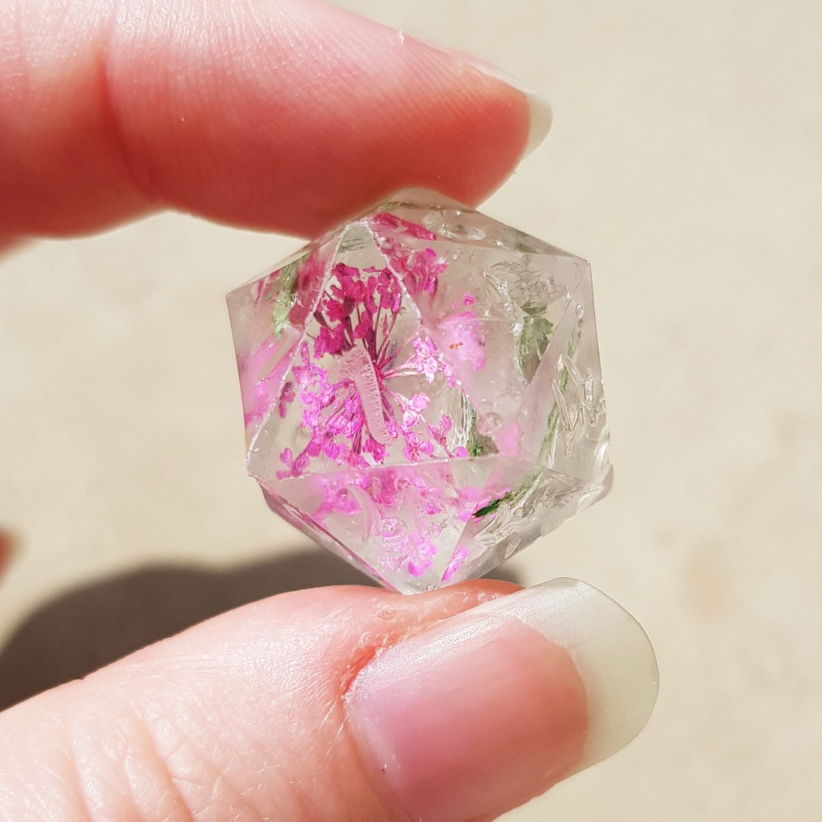 TheDiceling's tweet photo. Spring means flowers! Fresh from the mold unsanded d20 using cute pink flowers!
๐ธ #dnd #dnd5e #dice #dicegoblin #diceporn #polyhedraldice #diceaddict #resindice #dicemaker #ttrpg #sharpdice #handmadedice #critters #d20 #thediceling ๐ธ https://t.co/o2zsJk95Lu