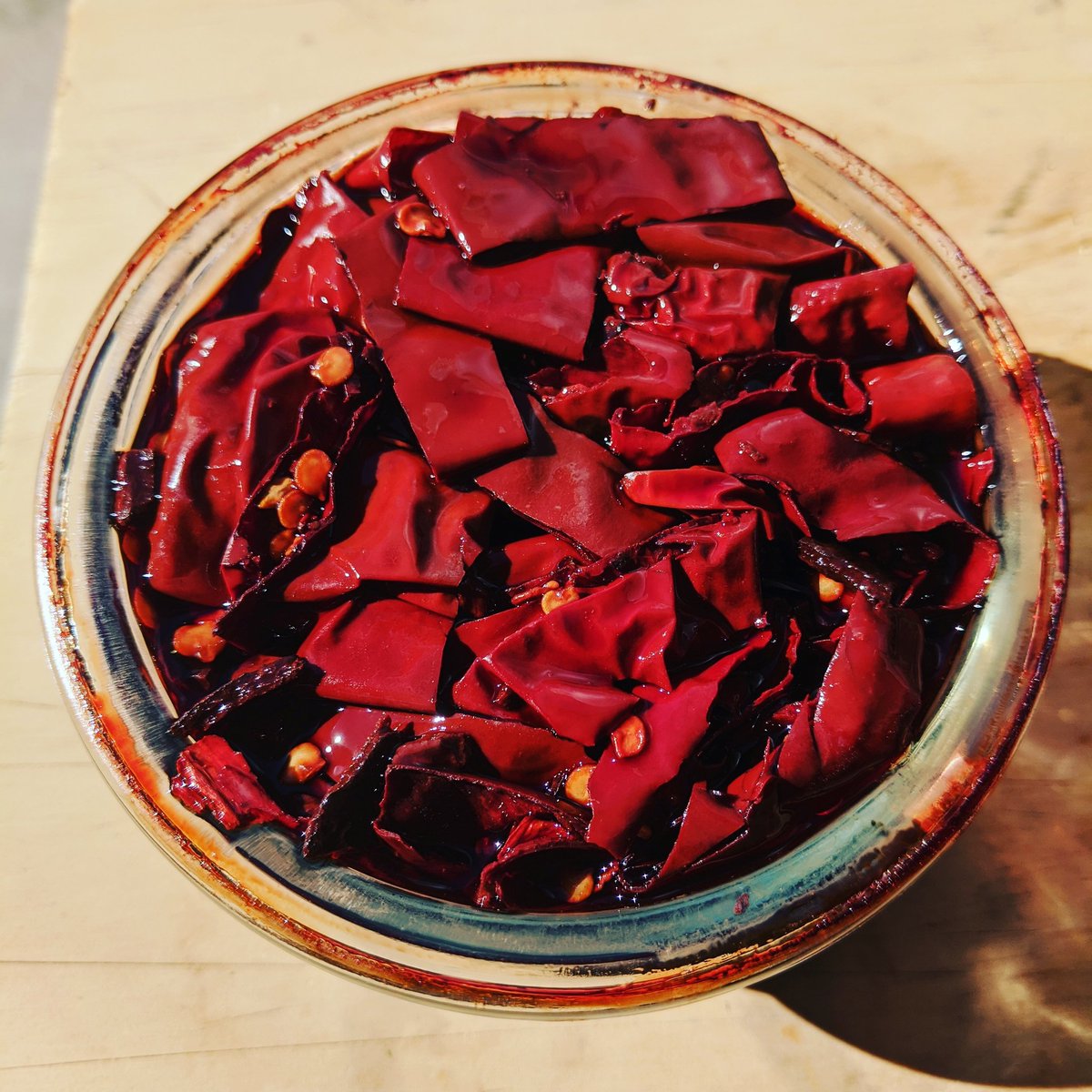 SnowLionBrewing's tweet photo. Guajillos, chile de รกrbol, and cinnamon chips soaked in vodka for two weeks. Smells great and nice heat. Time to add this to the Mayan imperial Stout. ๐ป๐ถ๏ธ
#homebrewing #chilebeer #secondary #dryspice #mayanimperialstout #snowlionbrewing https://t.co/V5PExSQMsm