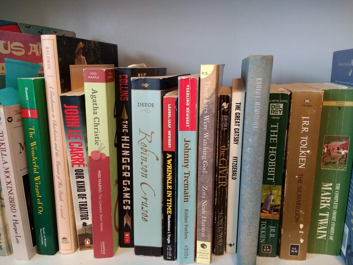 CMSEaglesRead's tweet photo. National Library Week 2020 looks a little different this year.  My pics are a random shelf and my read stack since the "break" started.  #kcsdschools #read  #NationalLibraryWeek #SCASL https://t.co/ZUdExa43mT