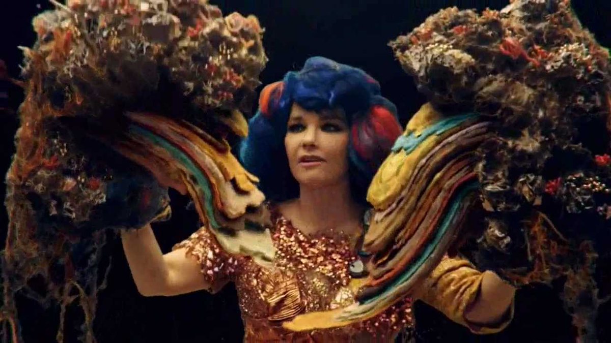 Mutual Core (2012)Commissioned and premiered at the MOCA in Los Angeles, portrays Björk in a sand bed, while various rocks revolve around her. At the end of the video, two rocks unite to form a volcano, which shapes resemble Björk's face features