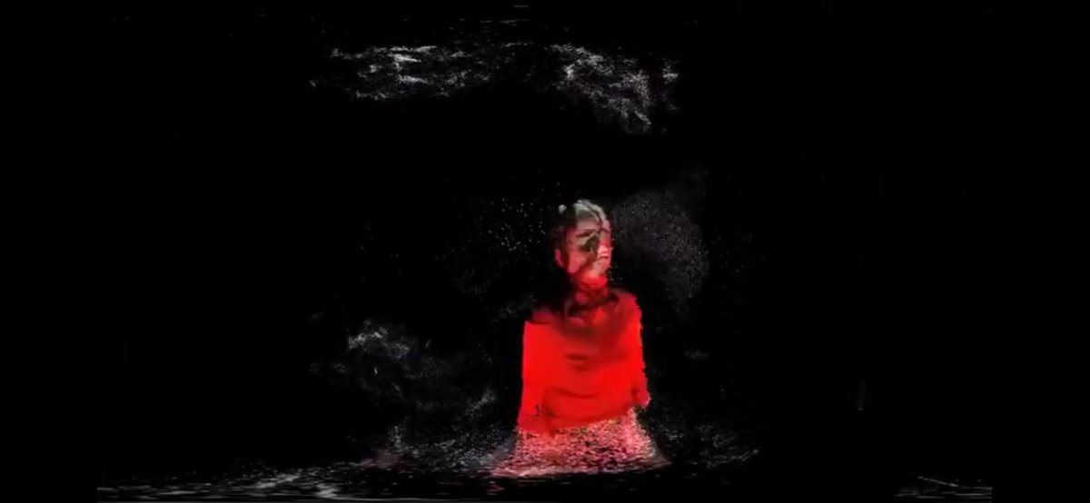 Quicksand [Virtual Reality] (2016)Shot at the Miraikan museum in Tokyo as the first VR live stream on YouTube. The VR video features Björk singing while wearing a mask, created by Neri Oxman, which reproduces her nervous system, while various light effects are added on her