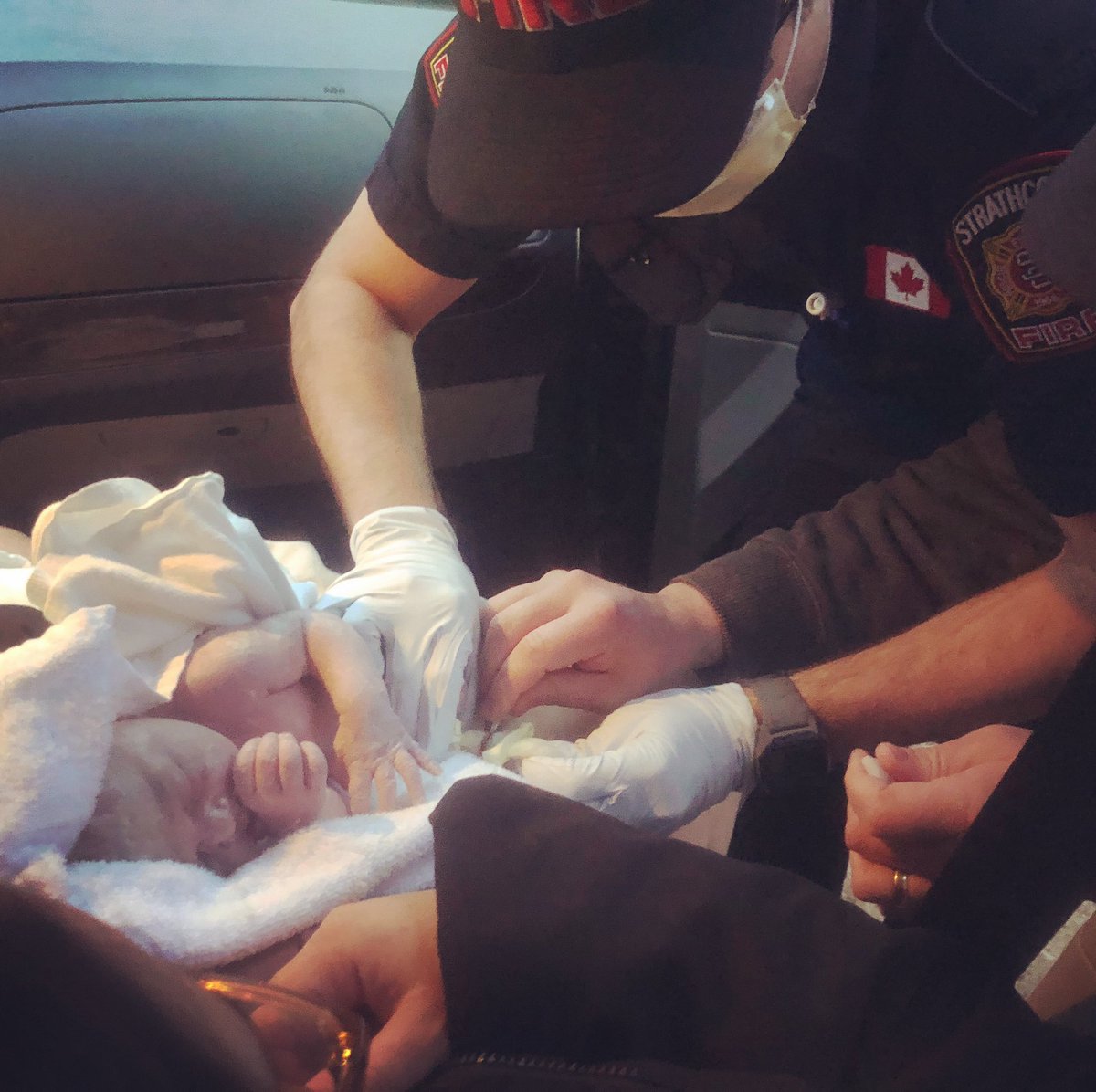 StrathconaFire's tweet photo. Members from station 5 helped welcome this young lady into the world last night. Delivered in her parents vehicle on the side of Highway 16, she arrived a bit unexpectedly but very healthy. Congratulations to Mom and Dad! 

*shared with permission of the parents. https://t.co/8iRb6V9qHM