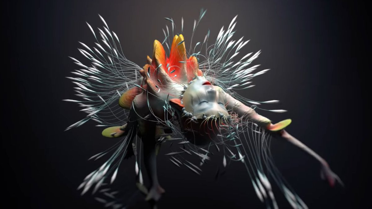 Tabula Rasa (2019)The video portrays Björk's face superimposed with a colorful mass, whose features resembles flowers and mountains. The figure sprouts petals and fronds as it twists and billows through the air