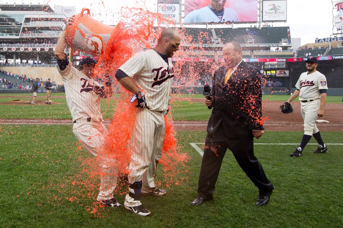 TwinsPics's tweet photo. June 1, 2013 // Ryan Doumit gets the orange Gatorade shower after hitting a walk-off triple. #MNTwins https://t.co/ubPtKFXxiu