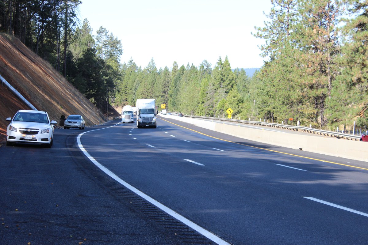 Semi-trucks travel eastbound on I-80 near Colfax