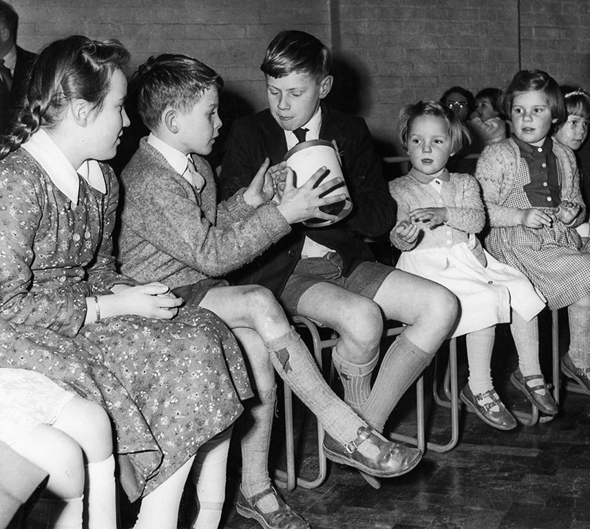 Can you help us identify the children and the special occasion being celebrated at The Letchworth Settlement?  As we head towards our 100th birthday we want to celebrate our history and a special book is being written. For more info visit letchworthsettlement.org