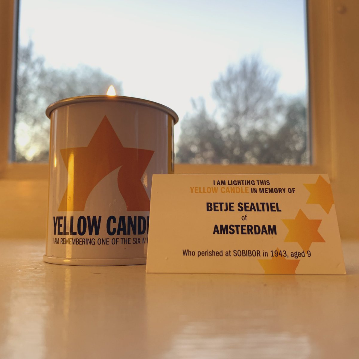 Sean_Amster's tweet photo. Lighting a candle in honor and memory of a life tragically taken. #NeverAgain #NeverForget #YomHaShoah #yellowcandle #yellowcandlephilly https://t.co/pYdsV9Ir44