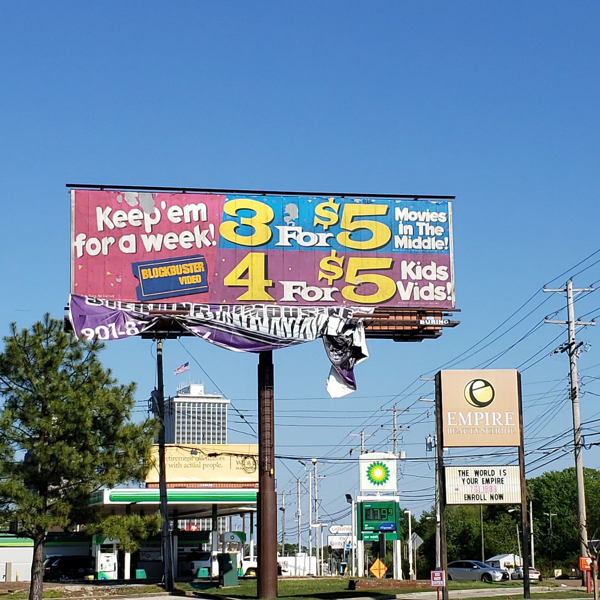 jcraig3k's tweet photo. Talk about the animals reclaiming nature, talk about air pollution lessening, and talk about falling oil prices all you want. All y'all can hush now because BLOCKBUSTER ADVERTISING LIVES AGAIN!! #blockbustervideo #wowwhatadifference #Memphis https://t.co/w4SwimlYm8
