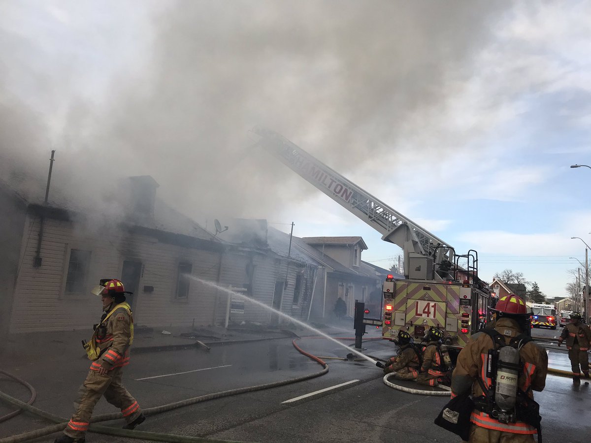 .<a href="/HamiltonFireDep/">Hamilton Fire Department</a> crews are battling a multiple alarm fire involving two well involved units on Wilson St. <a href="/hamiltonfire288/">Hamilton Firefighters 🇨🇦</a> <a href="/cityofhamilton/">City of Hamilton</a>