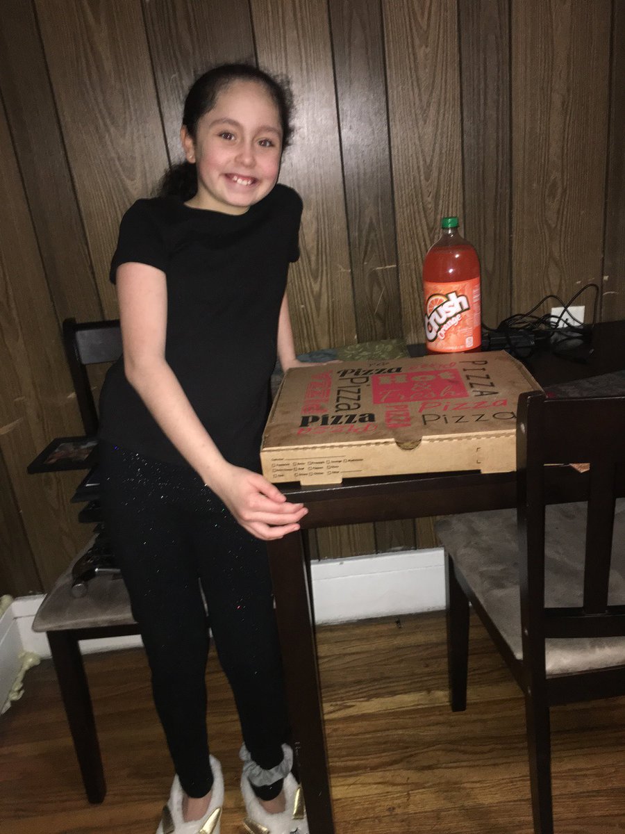 SeymourRedW's tweet photo. Our student winner, Jaeda, about to enjoy with her family. Show your Seymour pride this week to be entered. 5th grade wore the Seymour colors during a Zoom mtg. today! @SyracuseSchools https://t.co/LFbJmFURqw