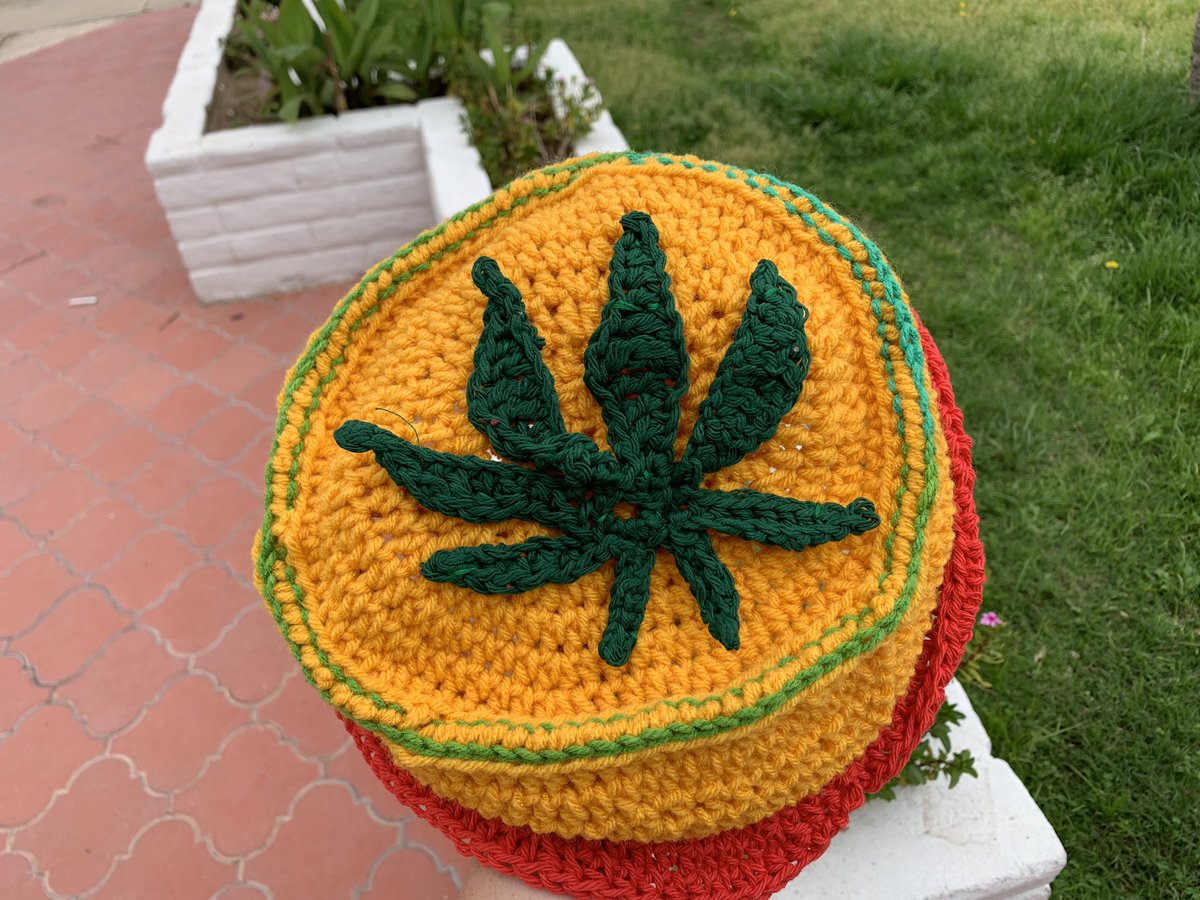  @sunnicaella hi i’m neeks  i’m a wire wrapper/resin/crochet artist! the prize i’m giving away is a rasta bucket hat 
