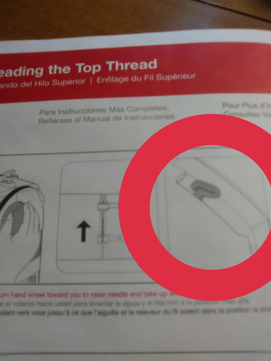 I'm now using the printed minimal instructions from the box (left) and the online manual (right) one of which is telling me to tug on a thing I don't see or recognize, one that shows NOTHING THERE, and then a THIRD diagram showing the first unrecognizable piece
