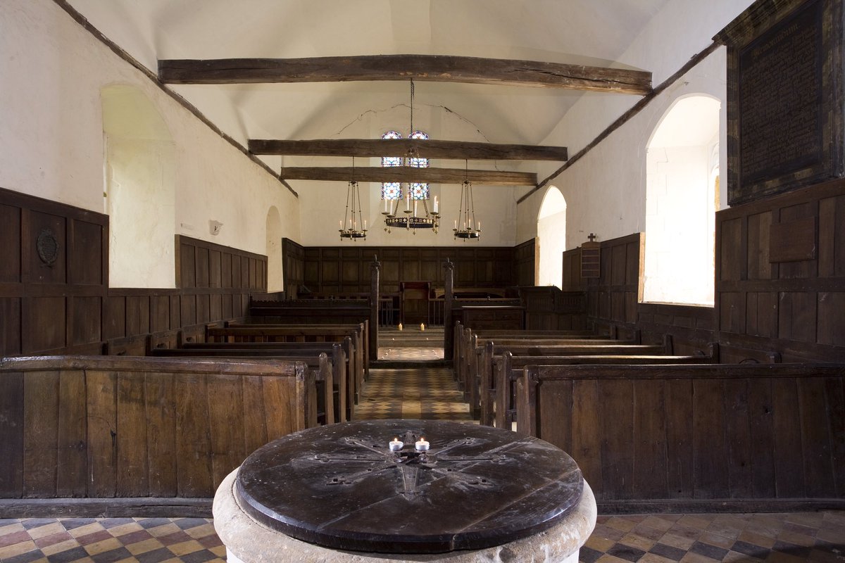 Boveney is small and uncomplicated.It’s built of chalk and flint with a timber tower that’s a bit of a wibbly, wobbly wonder: it has four massive oak legs and criss-cross of braces to hold it up.The panelled interior is a romantic vernacular of 18th and 19th-c fittings.(5/7)