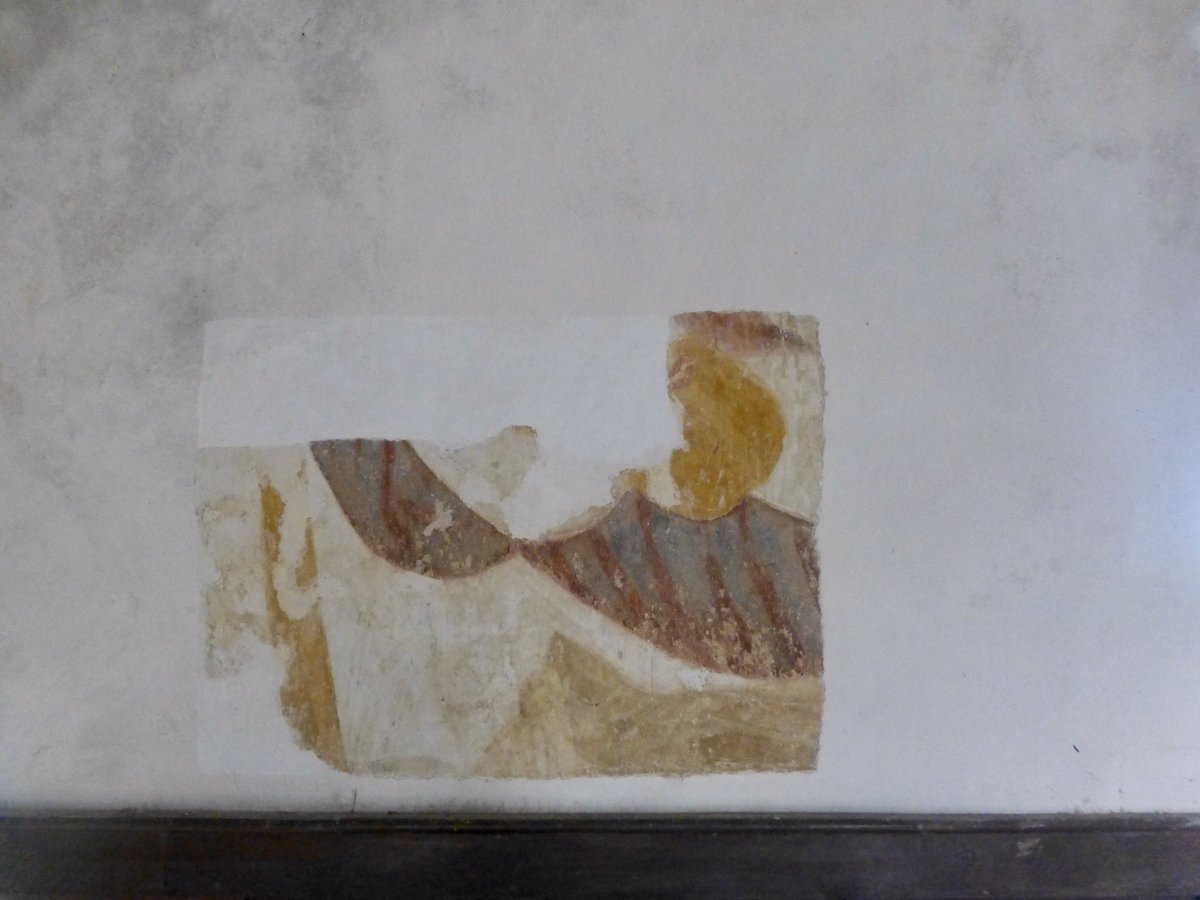 A few years ago, we uncovered a small section of wall-painting on the north wall.We believe it's Saint Christopher – rendered large, with a stripey collar, a red bushy beard and rosebud lips, looking out the south door on to the river…(6/7)