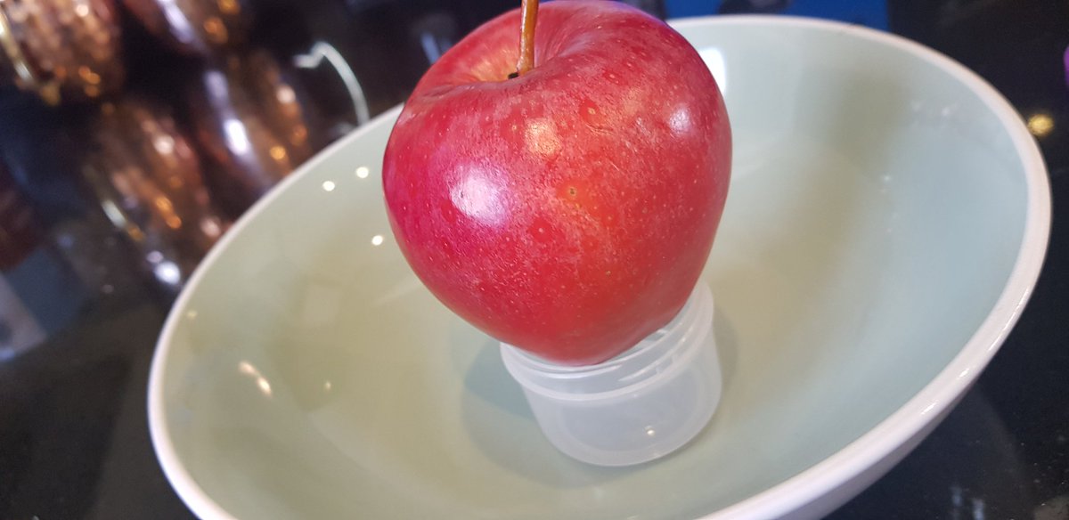 Experiment time! I saw a YouTube video of someone pouring hot water on an apple to see the wax. I'm no scientist but I'm going to give it a go. Forgive me Apple McAppleton, it's time to see the real you....