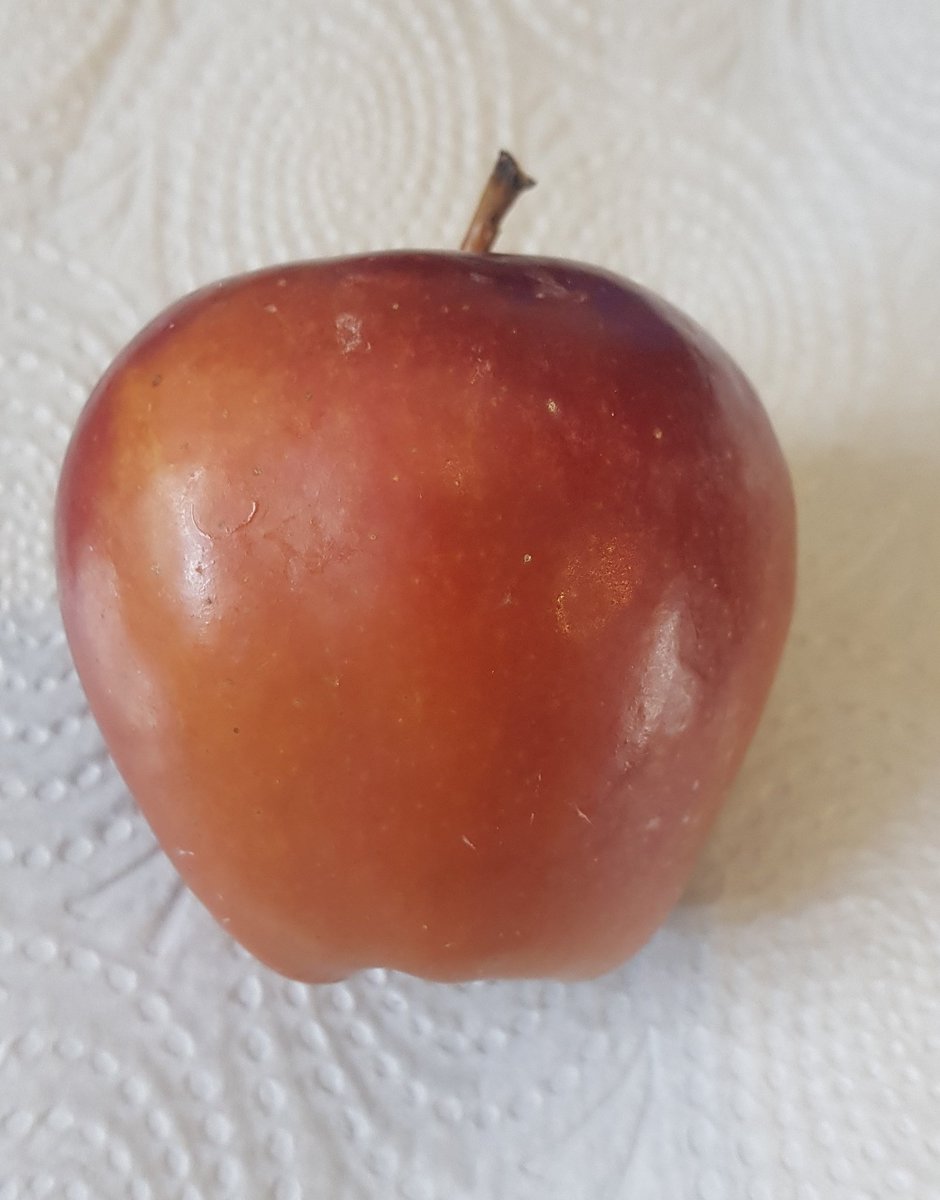 I'm wondering if wax is for preservation but also to make the apple look fresh and tasty? Without his wax coating, Apple McAppleton looks a slightly different colour and definitely less shiny.