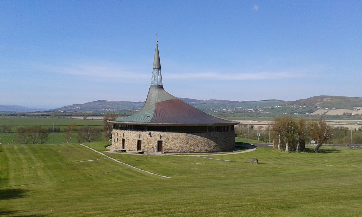McCormick’s best known Donegal church St Aengus, Speenogue, Burt (1967) was voted Building of the century in a national poll in last few years. This circular church with its distinctive copper clad roof with conical spire was inspired by Grianán of Aileach fort nearby  #Donegal
