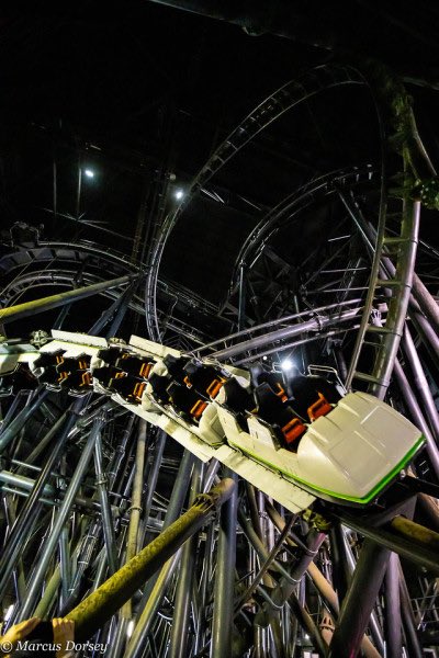 flight of fear (1996-present) is premiere rides LIM launch spaghetti bowl coaster. its also indoors nd its pretty dark. oh and smoke came out of it once??