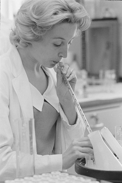 This lab technician is using a pipette in an unidentified laboratory, 1968.   #LabWeek2020   #histmed  https://medicalarchivescatalog.jhmi.edu/jhmi_perm...