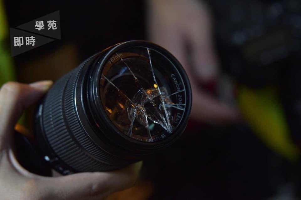 On the same day that HK fell seven places to 80th on the  @RSF_inter Press Freedom Index "because of its treatment of journalists during pro-democracy demonstrations", a police officer used a baton to break the filter of a student reporter's DSLR camera. Photo credit: Undergrad