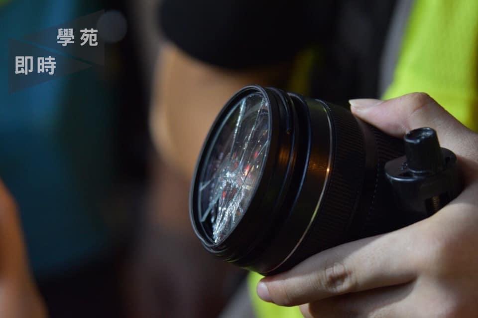On the same day that HK fell seven places to 80th on the  @RSF_inter Press Freedom Index "because of its treatment of journalists during pro-democracy demonstrations", a police officer used a baton to break the filter of a student reporter's DSLR camera. Photo credit: Undergrad