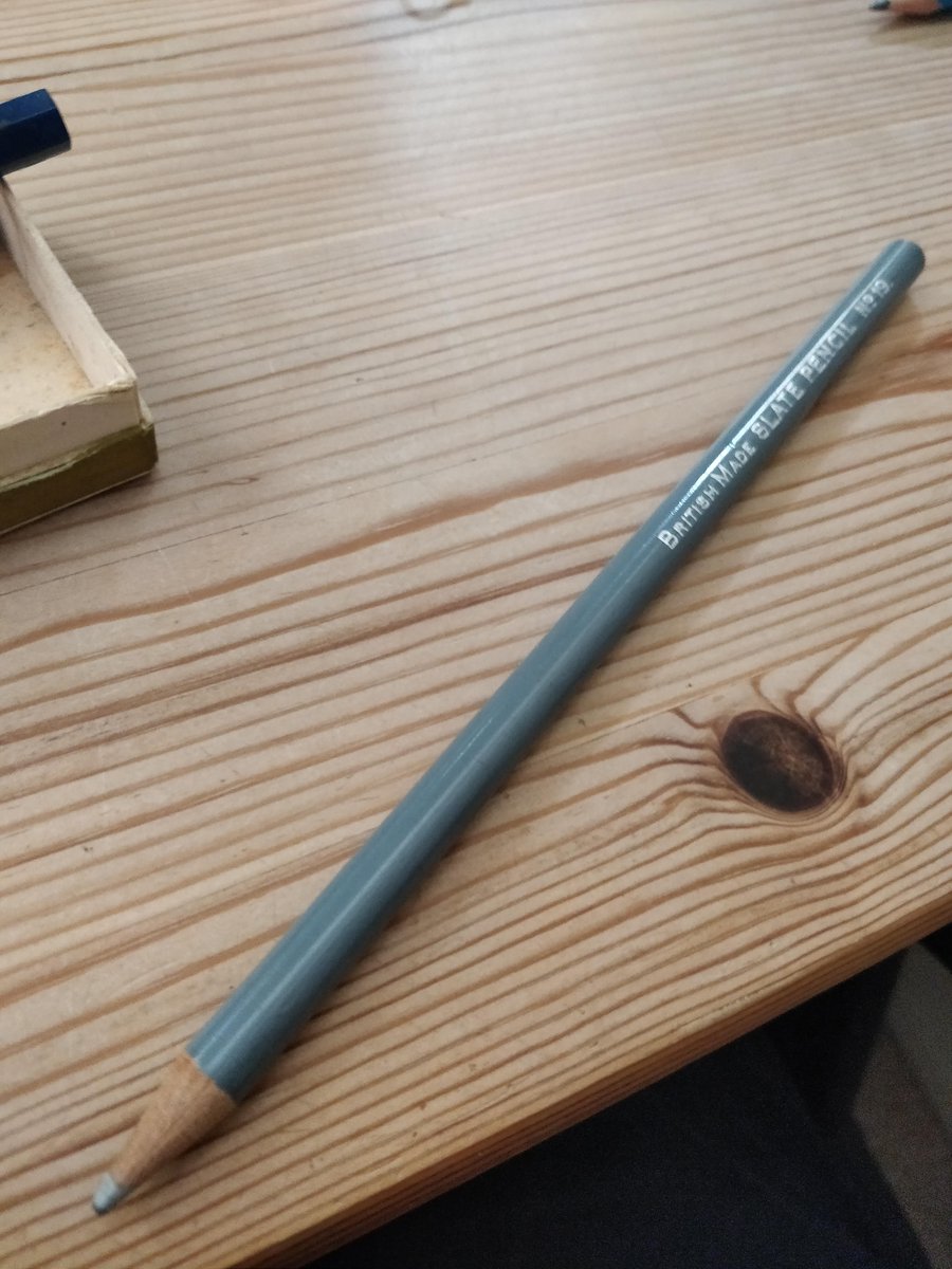 There's a random slate pencil - ie, for writing on slates. I know nothing about these, I'm a graphite man myself, but it's pleasing to write on a blackboard with it
