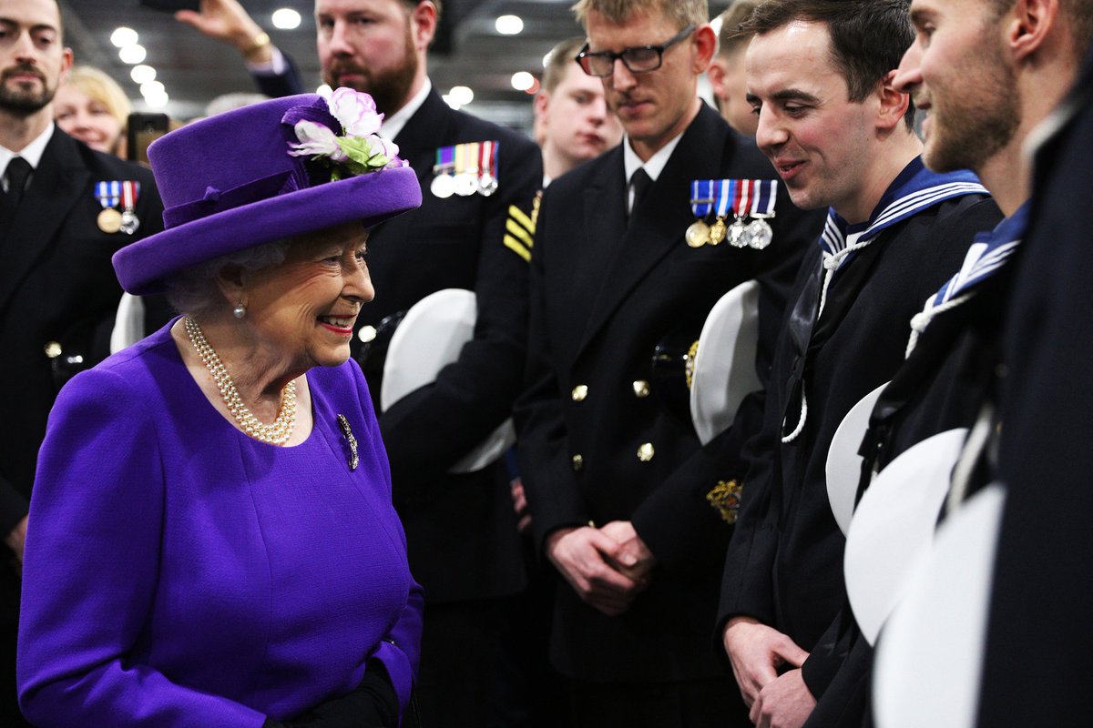 Her Majesty The Queen greeting sailors during the commissioning of HMS Queen Elizabeth in December 2017