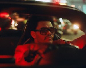 ''The Classic Convertibles''In The Weeknd's "Heartless," the storyline begins with him hopping out of a black convertible in Vegas at night while wearing sunglasses. Meanwhile, in Gomez's "Boyfriend," the singer is also shown driving a classic convertible at night wearing sg.