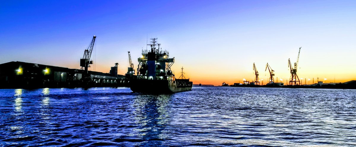 BelfastHarbour's tweet photo. In recent weeks we have had some beautiful sunrises over the Port.  Here is the Jolanta this morning as the sun came up.  #stayhome #StaySafe #KeepCalmAndWeWillCarryOn #APortDeliveringForEveryone https://t.co/nFczDcEQet